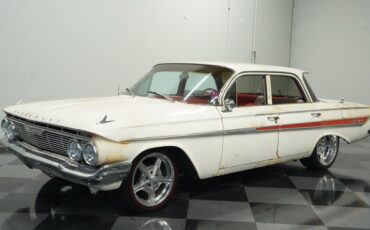 Unknown-Impala-1961-Patina-Red-ampamp-White-4
