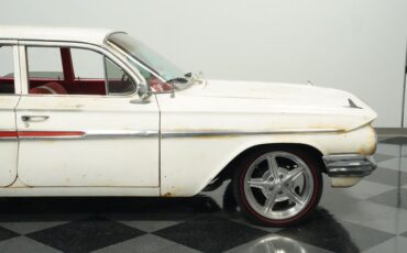 Unknown-Impala-1961-Patina-Red-ampamp-White-40