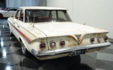 Unknown-Impala-1961-Patina-Red-ampamp-White-6