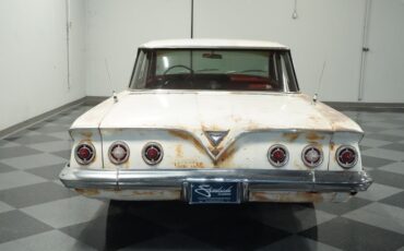 Unknown-Impala-1961-Patina-Red-ampamp-White-7