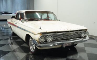 Unknown-Impala-1961-Patina-Red-ampamp-White-9