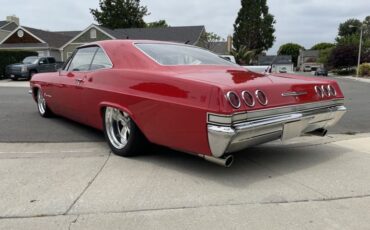 Unknown-Impala-1965-Red-tan-1