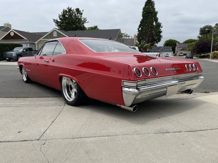 Unknown-Impala-1965-Red-tan-1