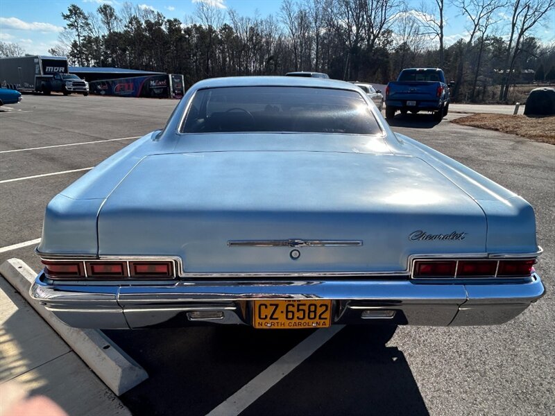 Unknown-Impala-1966-Black-Black-2