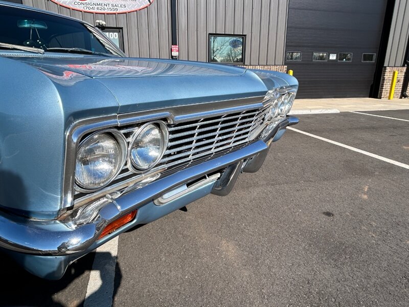 Unknown-Impala-1966-Black-Black-3