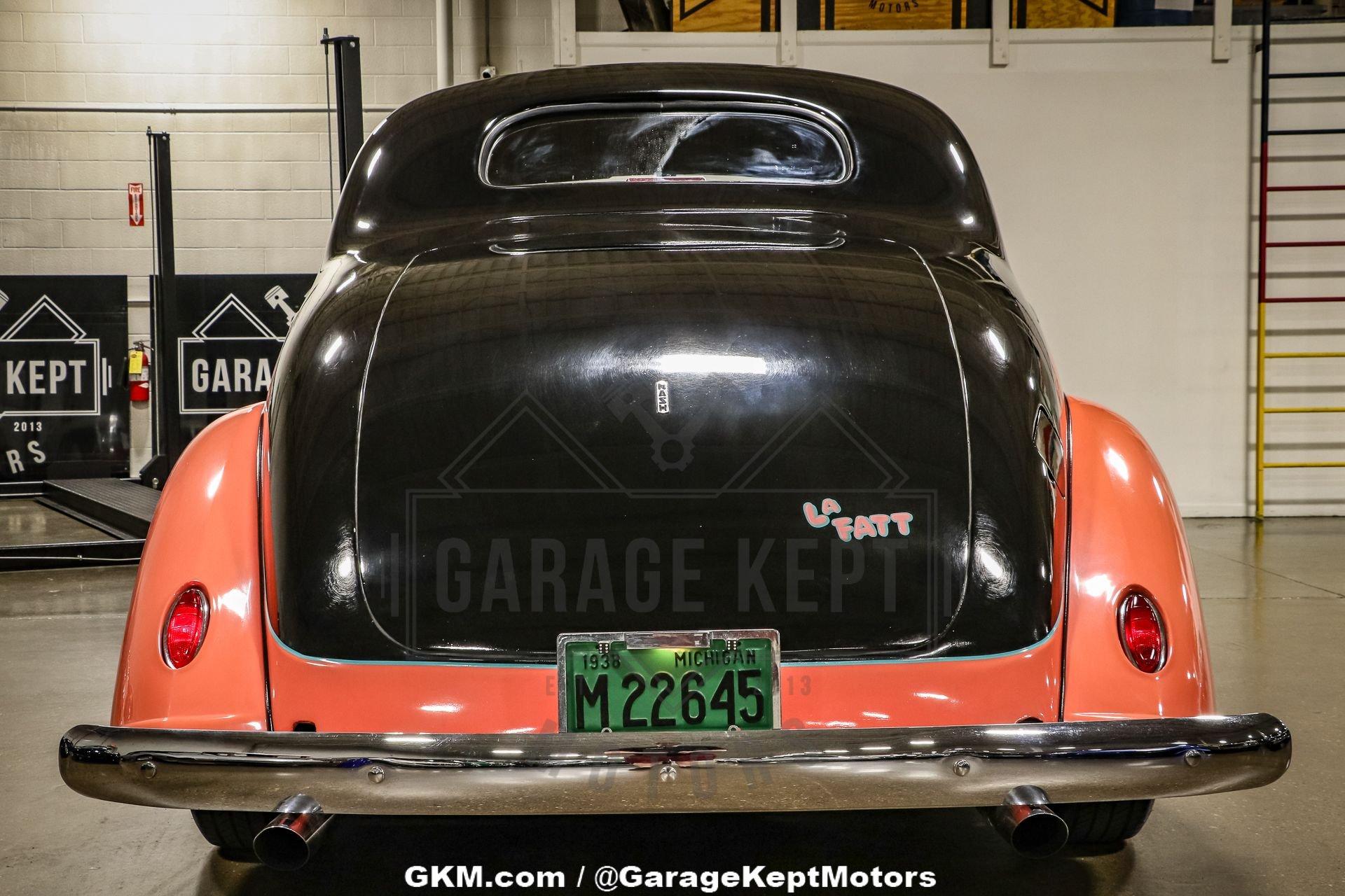 Unknown-Lafayette-1938-Black-And-Salmon-Black-49