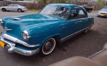 Unknown-Manhattan-1953-Peacock-Blue-1
