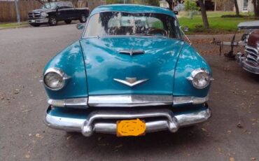 Unknown-Manhattan-1953-Peacock-Blue-12