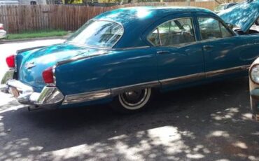 Unknown-Manhattan-1953-Peacock-Blue-17