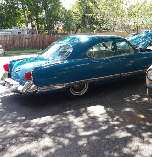 Unknown-Manhattan-1953-Peacock-Blue-17