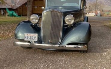 Unknown-Master-deluxe-1934-Silver-Tan-1