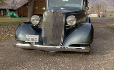 Unknown-Master-deluxe-1934-Silver-Tan-2