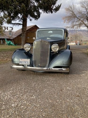 Unknown-Master-deluxe-1934-Silver-Tan-2