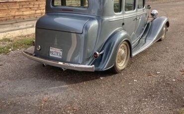 Unknown-Master-deluxe-1934-Silver-Tan-3
