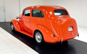 Unknown-Master-deluxe-1938-Orange-Gray-1