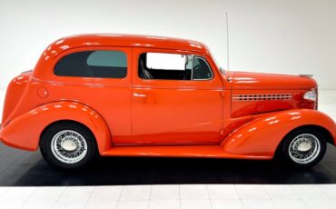 Unknown-Master-deluxe-1938-Orange-Gray-19