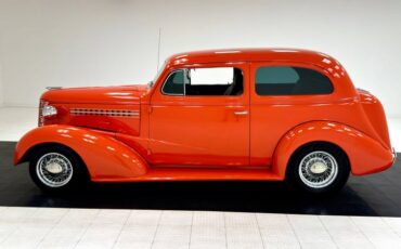 Unknown-Master-deluxe-1938-Orange-Gray