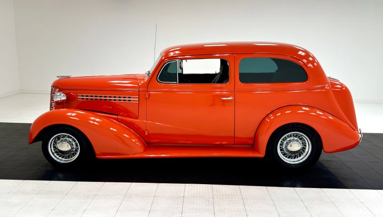 Unknown-Master-deluxe-1938-Orange-Gray