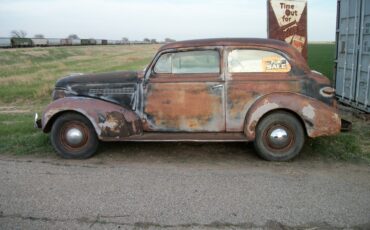 Unknown-Master-deluxe-1939-black-tan-1