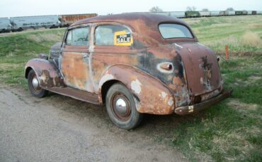 Unknown-Master-deluxe-1939-black-tan-2