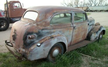 Unknown-Master-deluxe-1939-black-tan-4