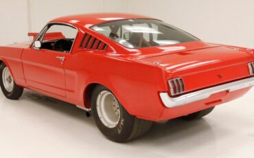 Unknown-Mustang-1965-Rangoon-Red-Black-1