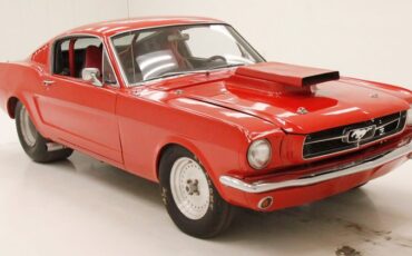 Unknown-Mustang-1965-Rangoon-Red-Black-10