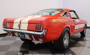 Unknown-Mustang-1965-Rangoon-Red-Black-11