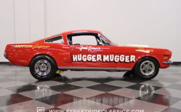 Unknown-Mustang-1965-Rangoon-Red-Black-12