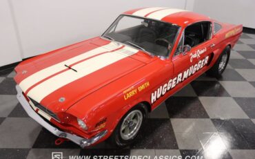 Unknown-Mustang-1965-Rangoon-Red-Black-17