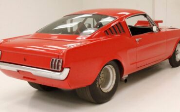 Unknown-Mustang-1965-Rangoon-Red-Black-2