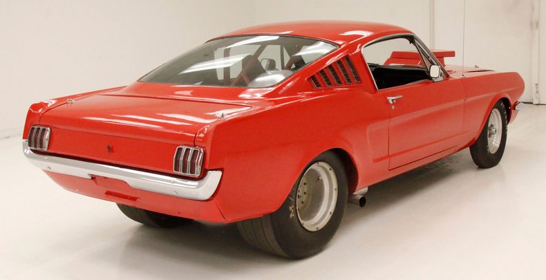 Unknown-Mustang-1965-Rangoon-Red-Black-2