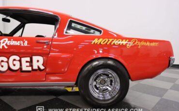 Unknown-Mustang-1965-Rangoon-Red-Black-22