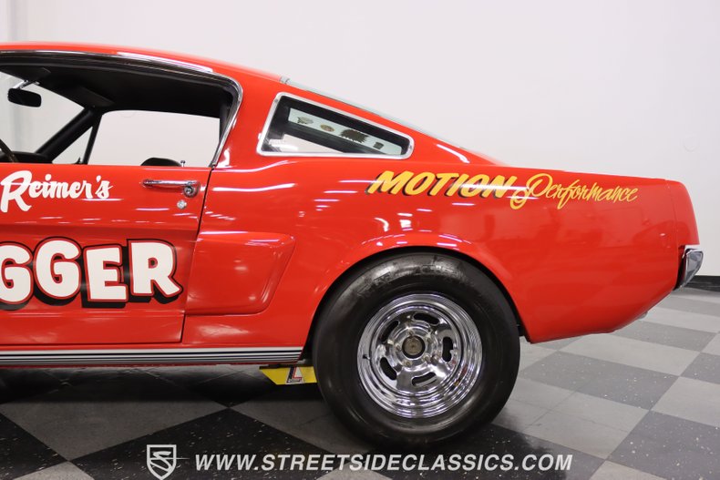 Unknown-Mustang-1965-Rangoon-Red-Black-22