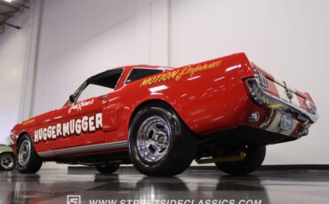 Unknown-Mustang-1965-Rangoon-Red-Black-23
