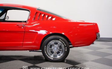Unknown-Mustang-1965-Rangoon-Red-Black-24
