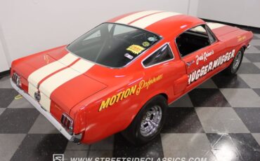 Unknown-Mustang-1965-Rangoon-Red-Black-24