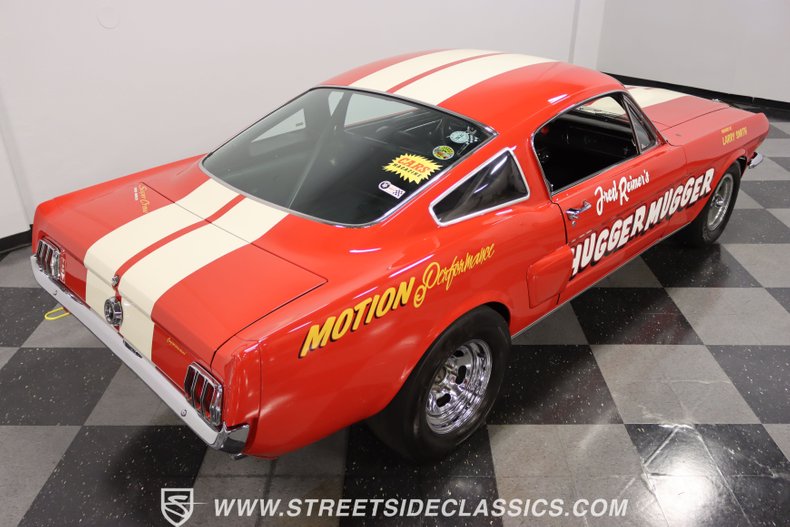 Unknown-Mustang-1965-Rangoon-Red-Black-24
