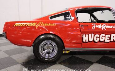 Unknown-Mustang-1965-Rangoon-Red-Black-27
