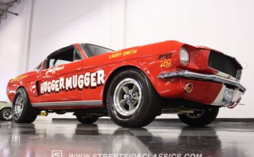 Unknown-Mustang-1965-Rangoon-Red-Black-29