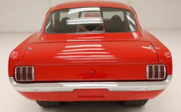 Unknown-Mustang-1965-Rangoon-Red-Black-3