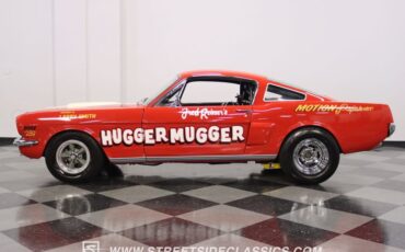 Unknown-Mustang-1965-Rangoon-Red-Black-3