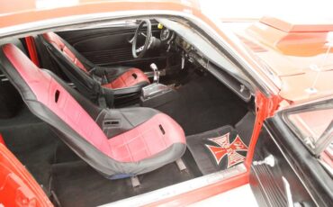 Unknown-Mustang-1965-Rangoon-Red-Black-34