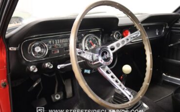 Unknown-Mustang-1965-Rangoon-Red-Black-36
