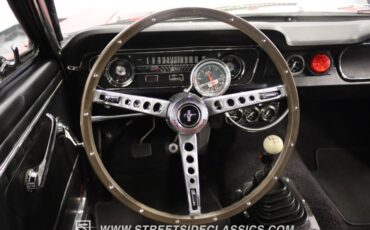 Unknown-Mustang-1965-Rangoon-Red-Black-37
