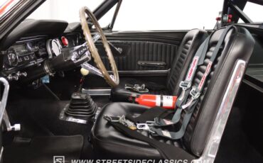 Unknown-Mustang-1965-Rangoon-Red-Black