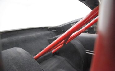 Unknown-Mustang-1965-Rangoon-Red-Black-38