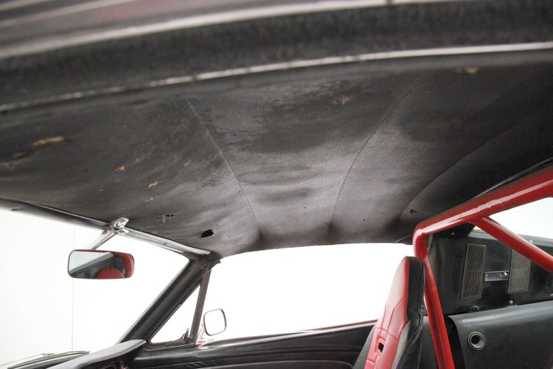 Unknown-Mustang-1965-Rangoon-Red-Black-40