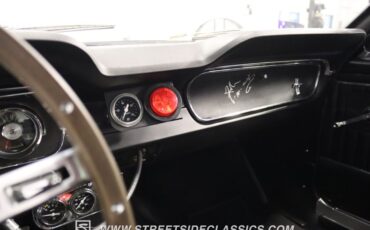 Unknown-Mustang-1965-Rangoon-Red-Black-41