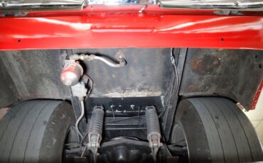 Unknown-Mustang-1965-Rangoon-Red-Black-44